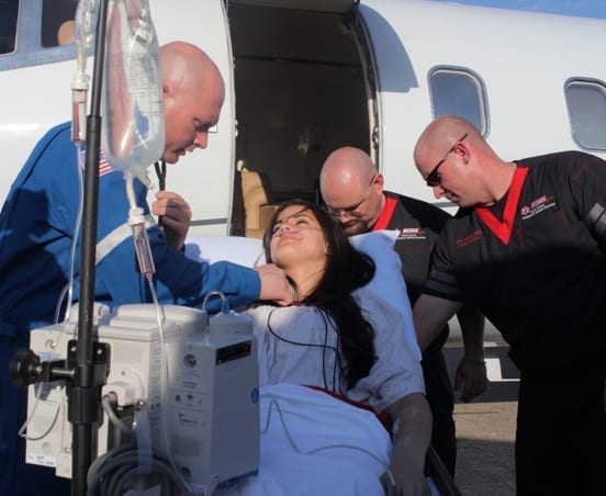 Loading Patient on a Lear Jet